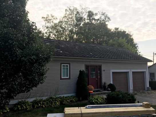 Before: roof 24 before its new metal roof