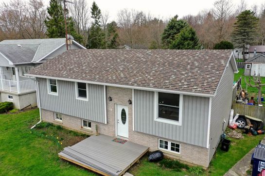 Before: roof 30 before its new metal roof