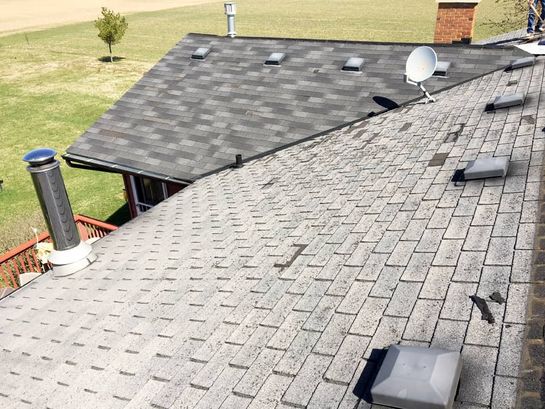 Before: roof 28 before its new metal roof